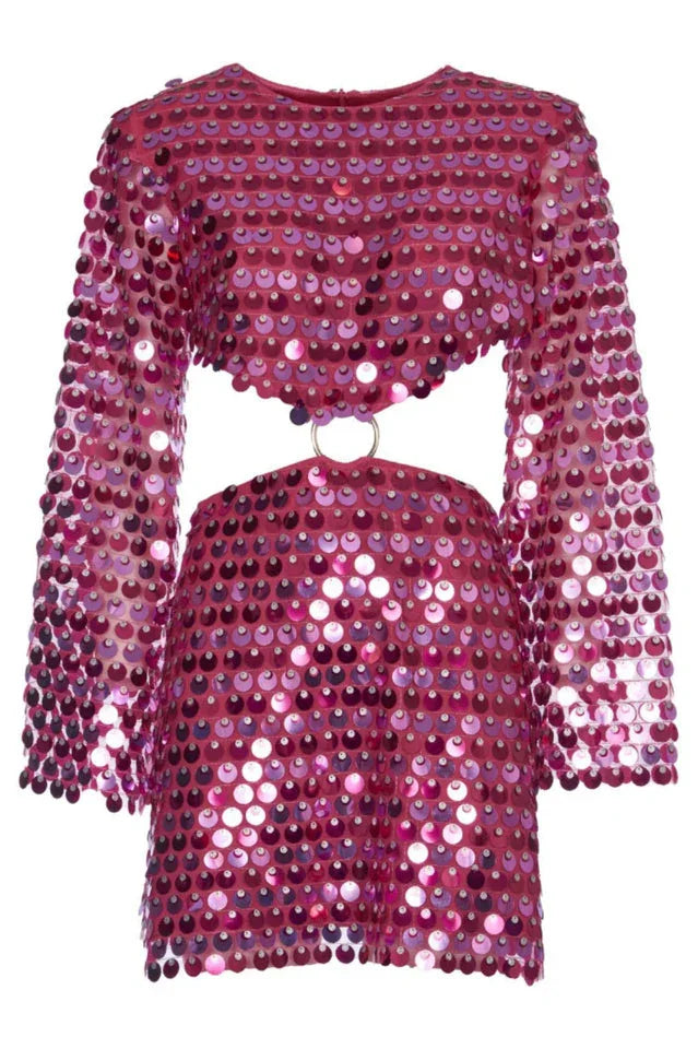 Close-up front view of the pink sequined crop top and mini skirt showing the cut-out detail.