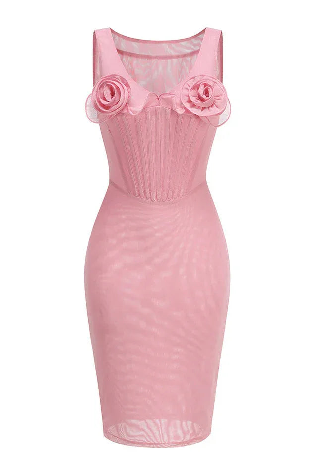 Front view of a pink mesh sheath dress with a structured bodice and floral embellishments.