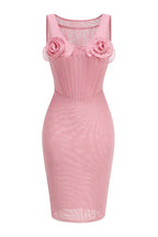 Front view of a pink mesh sheath dress with a structured bodice and floral embellishments.