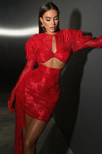 Woman wearing a red mini dress with puffed sleeves and a cut-out detail