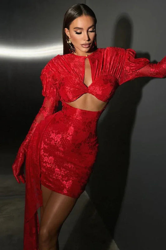Woman wearing a red mini dress with puffed sleeves and a cut-out detail