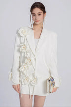 Front view of a white floral blazer dress