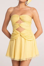 Yellow strapless mini dress with cut-outs and draping