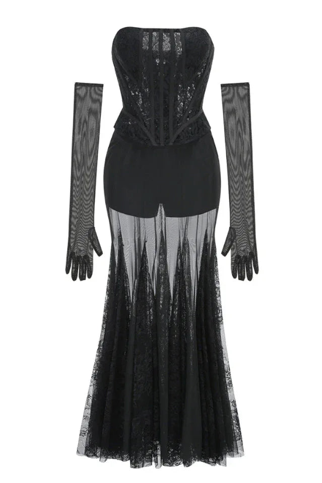 Black lace corset gown with sheer skirt and long sleeves laid flat