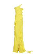 A yellow one-shoulder ruffled gown displayed on a mannequin, emphasizing its draped silhouette and flowing fabric.
