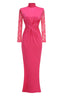 Front view of a hot pink satin gown with lace sleeves and a mermaid hem.