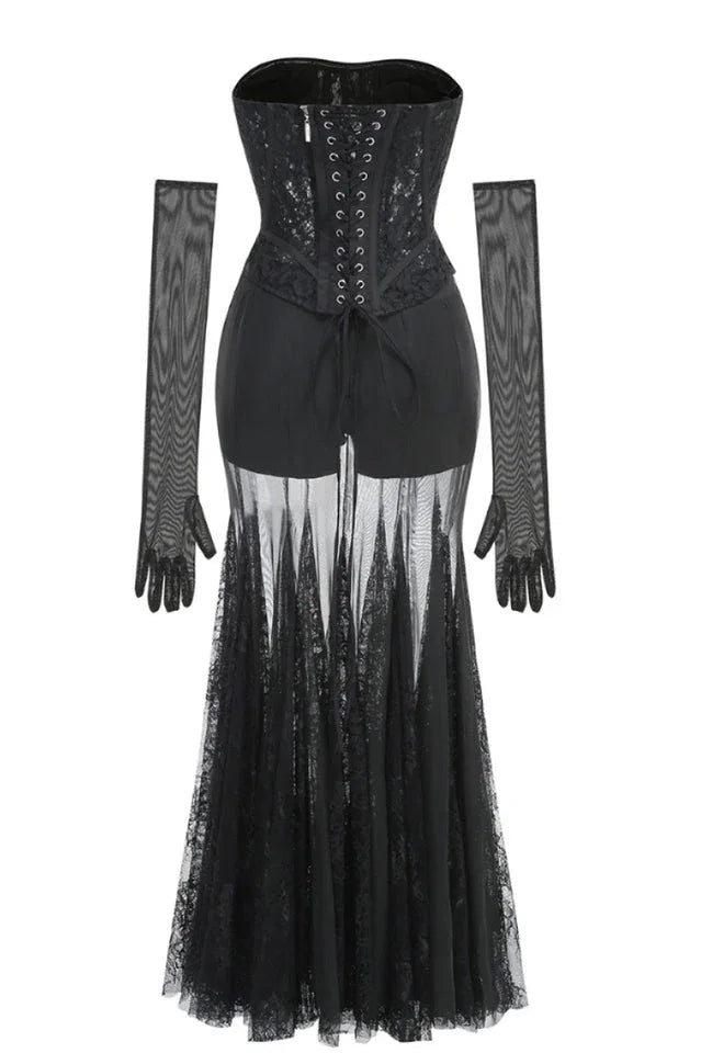 Black lace corset gown with sheer skirt and long sleeves from the back laid flat