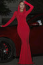 Woman in a long red hooded dress standing next to a red car.