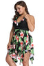 Plus-size women's black floral print halter neck one-piece swimsuit with skirt overlay, side view