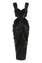 Back view of a black sequined gown with a zipper closure and draped skirt.