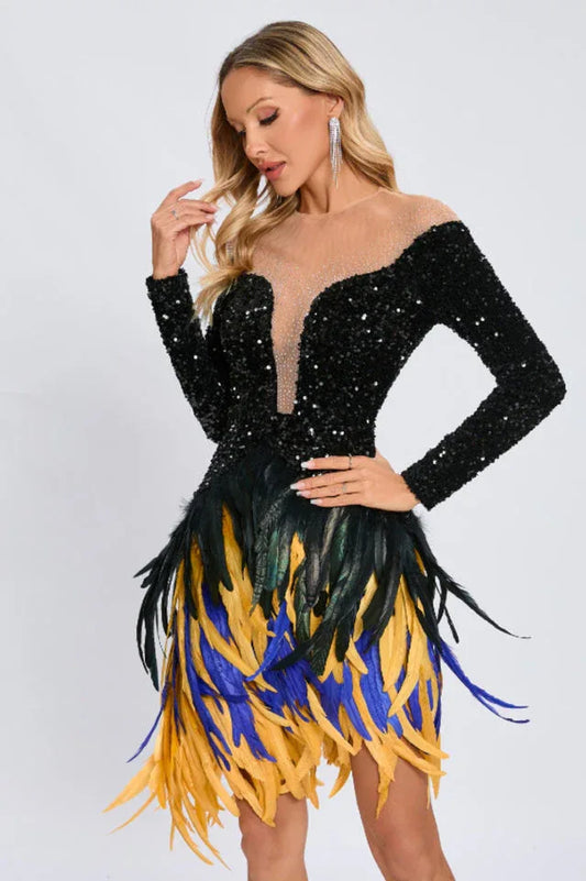 Close-up of a woman wearing a black sequined dress with a feather trim hemline