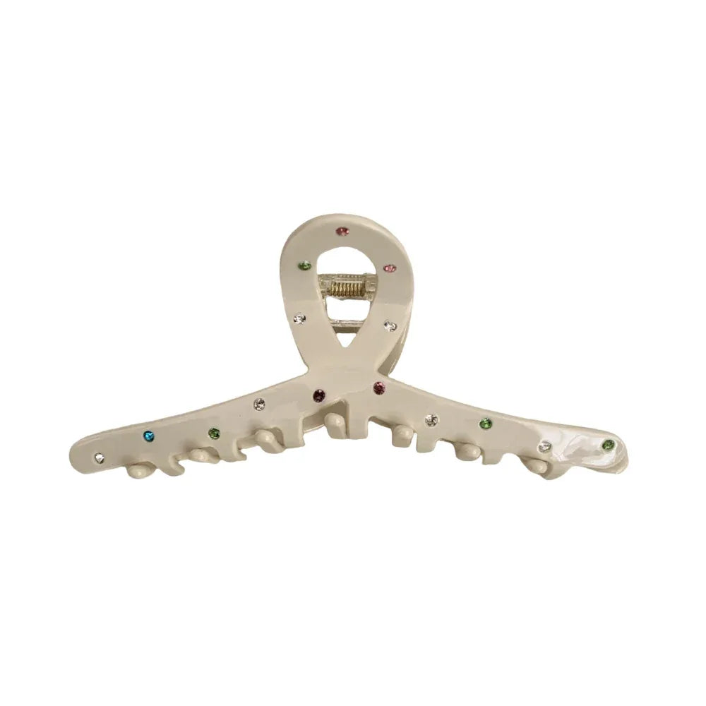 A cream-colored claw clip with colorful gemstones Main image