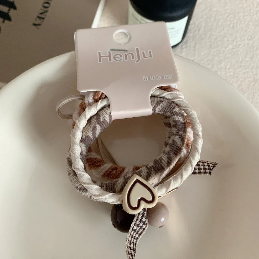 Chic hair ties with heart, bead, and bow charms - View 7 | TEVQA