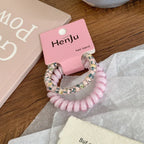 Ditsy floral spiral hair tie in pastel color - View 7 | TEVQA