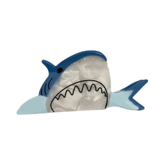 A single blue and white shark hair clip
