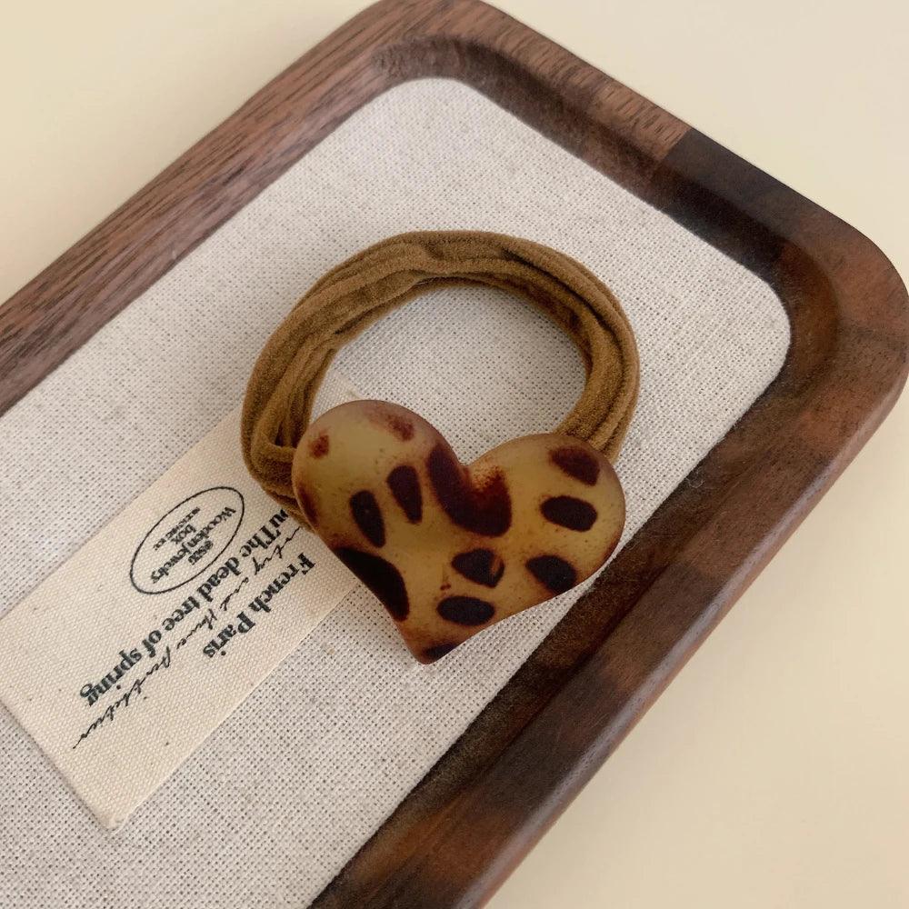 Matte leopard charm hair tie with a soft knit band - View 6 | TEVQA