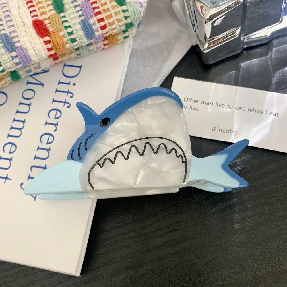 Blue novelty shark acetate hair claw clip with pearlescent white belly and open mouth detail - View 6 | TEVQA