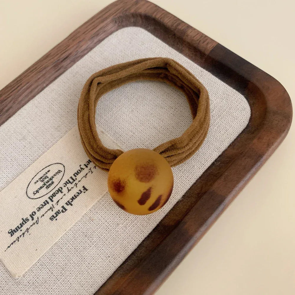 Matte leopard charm hair tie with a soft knit band - View 8 | TEVQA