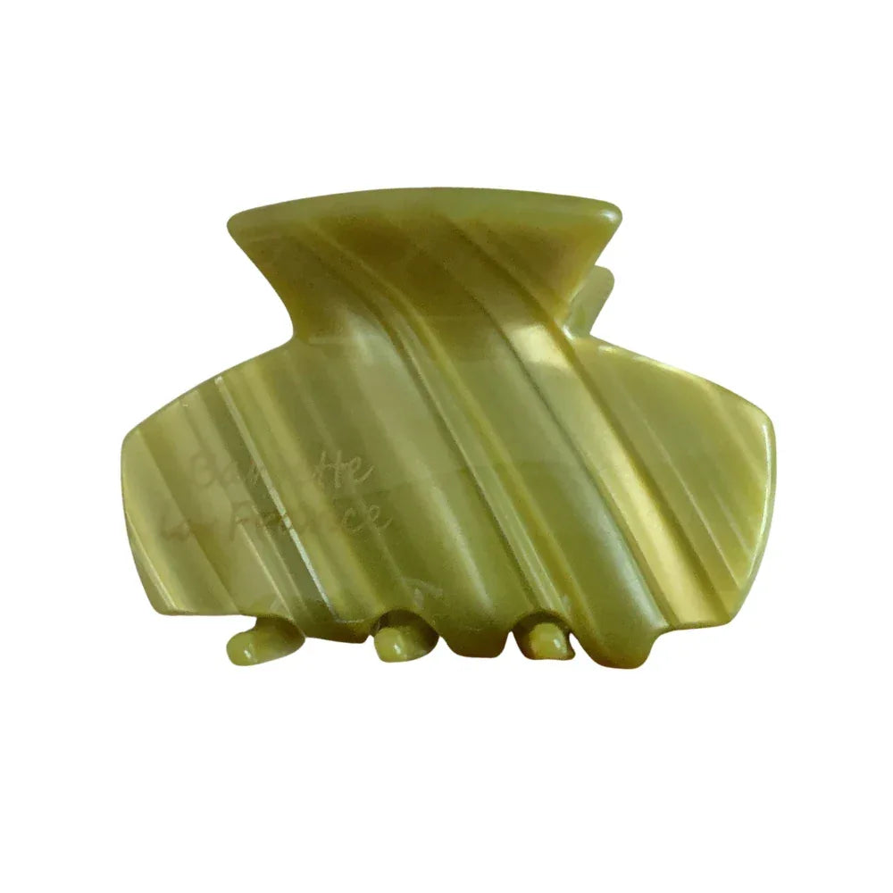 A single green swirled acetate claw hair clip with branded lettering. Main image