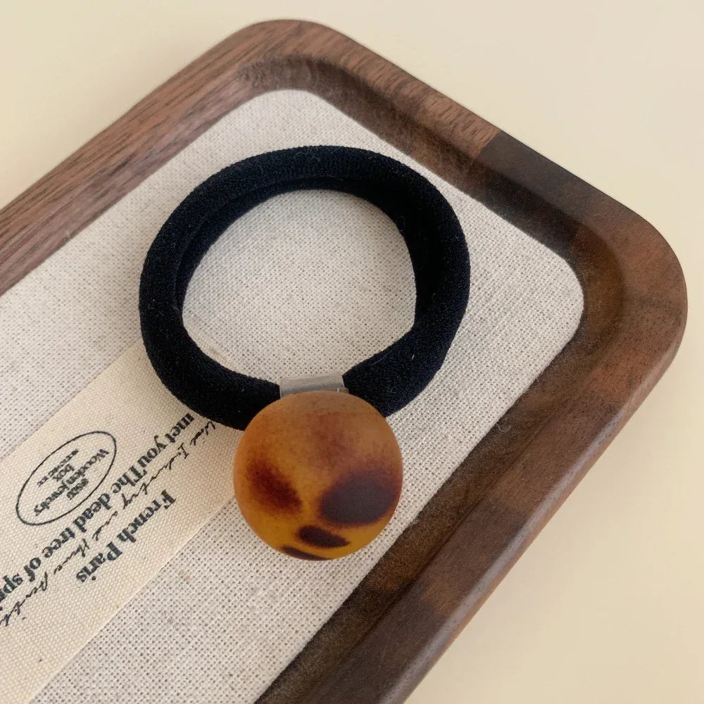 Matte leopard charm hair tie with a soft knit band - View 10 | TEVQA