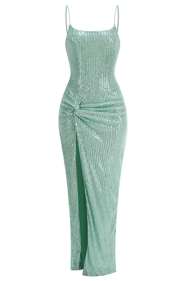 Front view of a mint green sequined gown with a high slit and ruched detail.