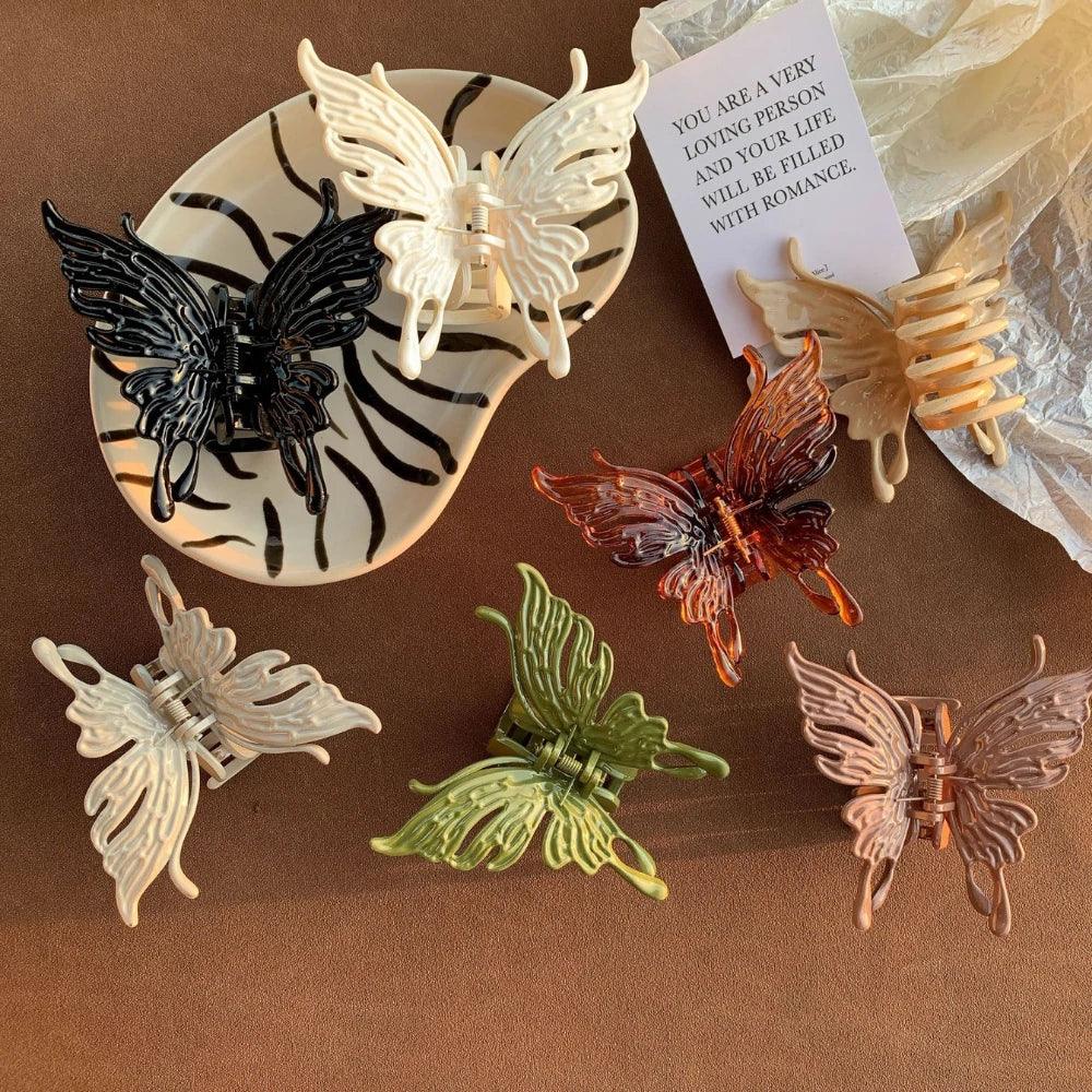 group of butterfly hair claws displayed with a small card