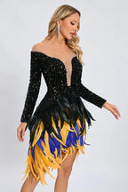 Full body shot of a woman in a dazzling black sequined dress adorned with vibrant feathers