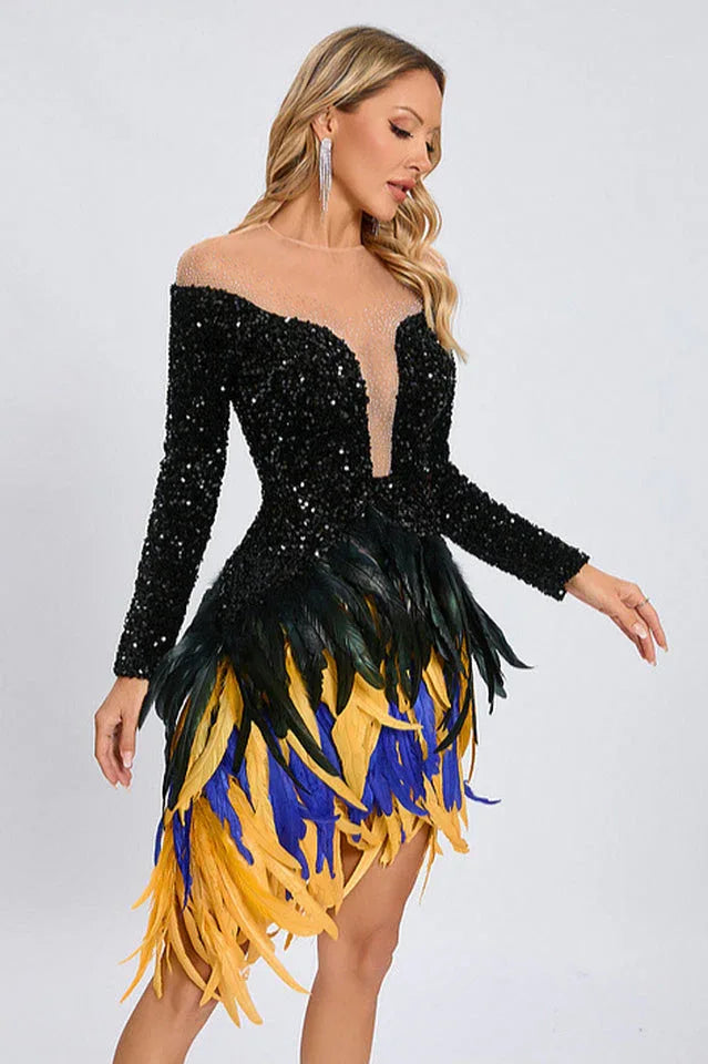Full body shot of a woman in a dazzling black sequined dress adorned with vibrant feathers