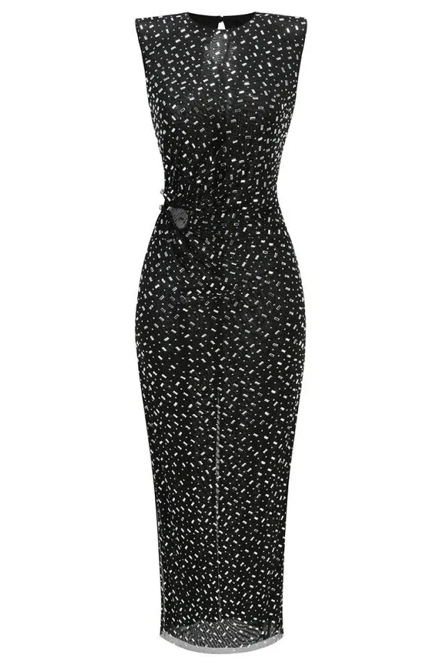 Front view of a black sequined column dress with a cutout waist and button detail