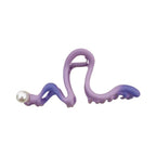 Purple and blue S-shaped hair claw clip with a pearl accent