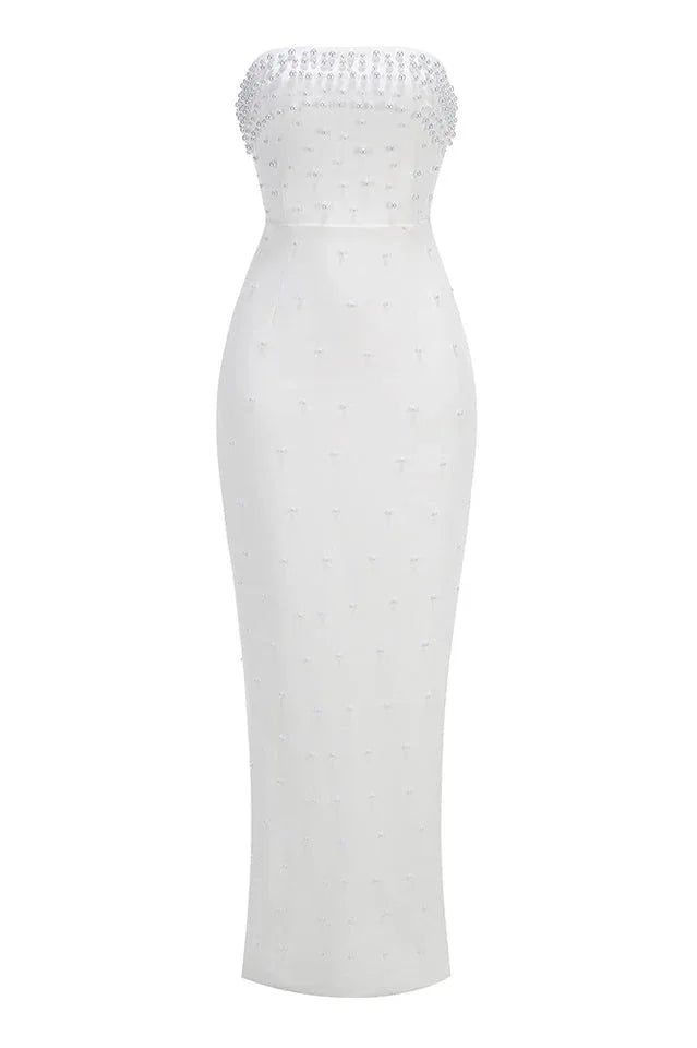 Full-length studio shot of a white strapless pearl-embellished column gown