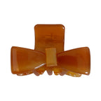 translucent amber bow claw clip