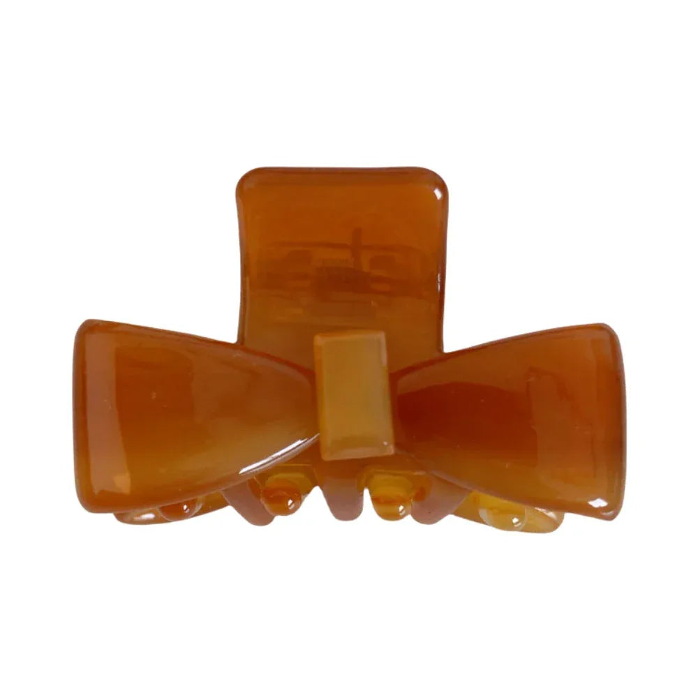 translucent amber bow claw clip