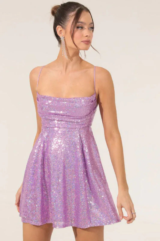 front view of a purple sequin mini dress with spaghetti straps and a square neckline