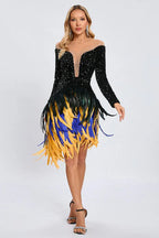 Model showcasing a glamorous black sequined dress with a striking feather skirt