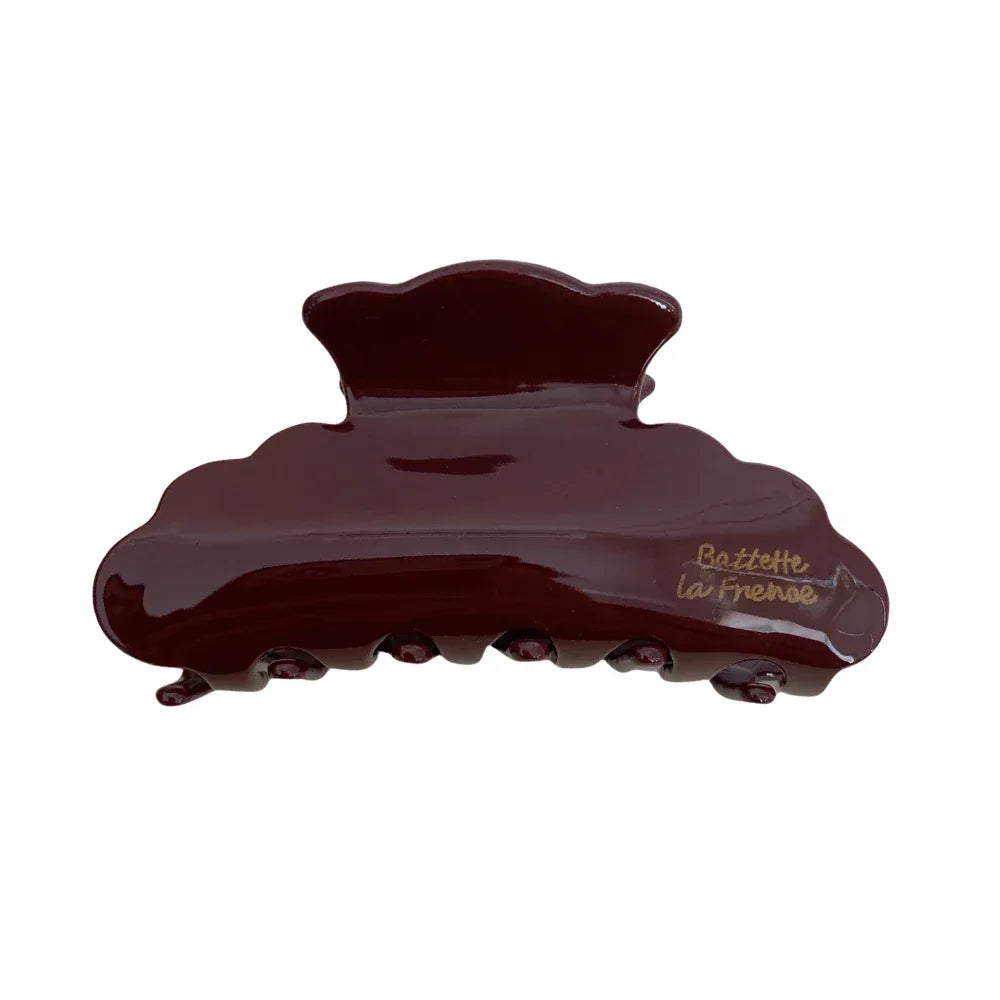 A single burgundy hair claw clip with a glossy finish and a cloud-like shape. The clip has embossed gold lettering that reads 'Battette La France'. Main image