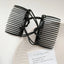 close-up of black interlocking hair combs