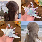 Woman with seashell hair clip in brown hair