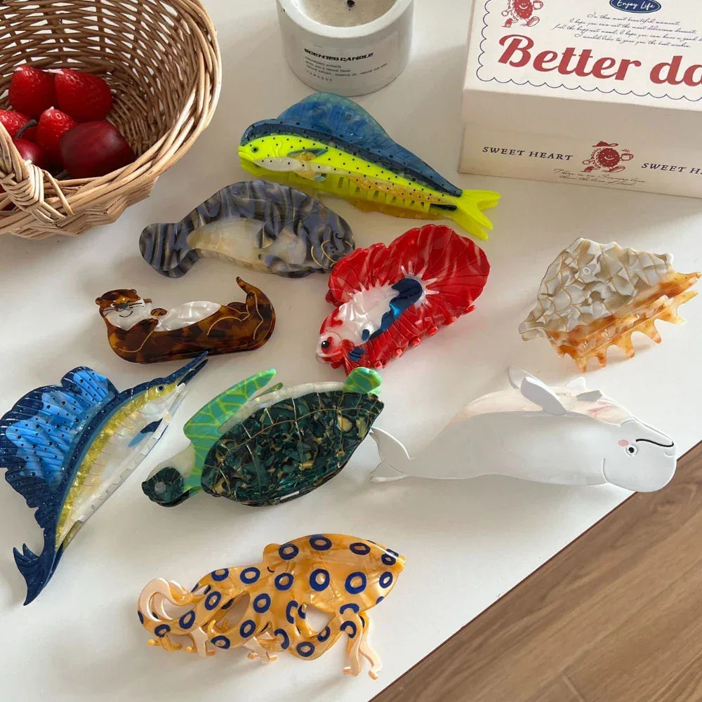 A selection of colorful and detailed hair clips displayed on a table