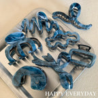 collection of blue marbled hair claws
