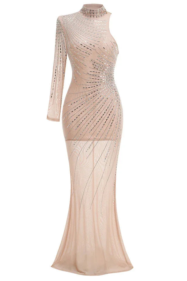studio shot of a long, nude-colored, embellished dress with a high neck and one long sleeve
