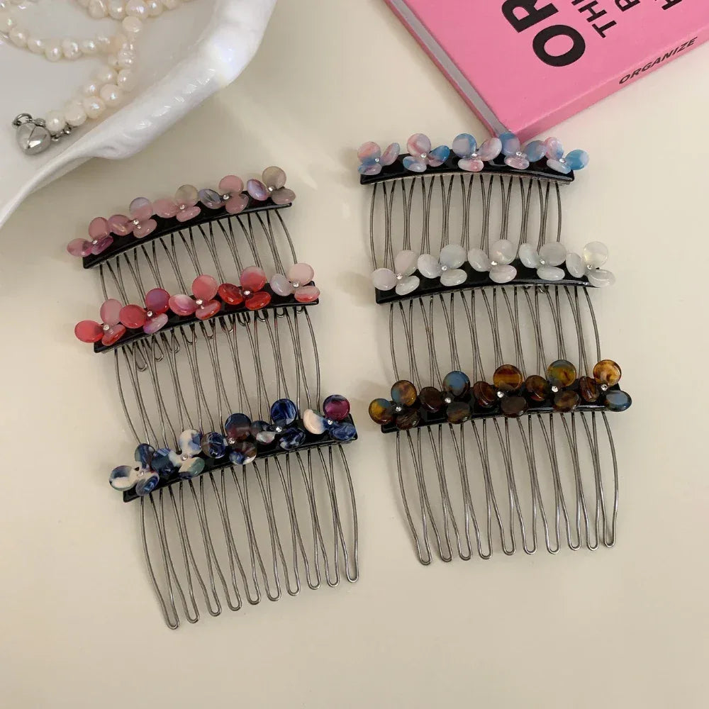 Collection of hair combs featuring floral designs in various color palettes