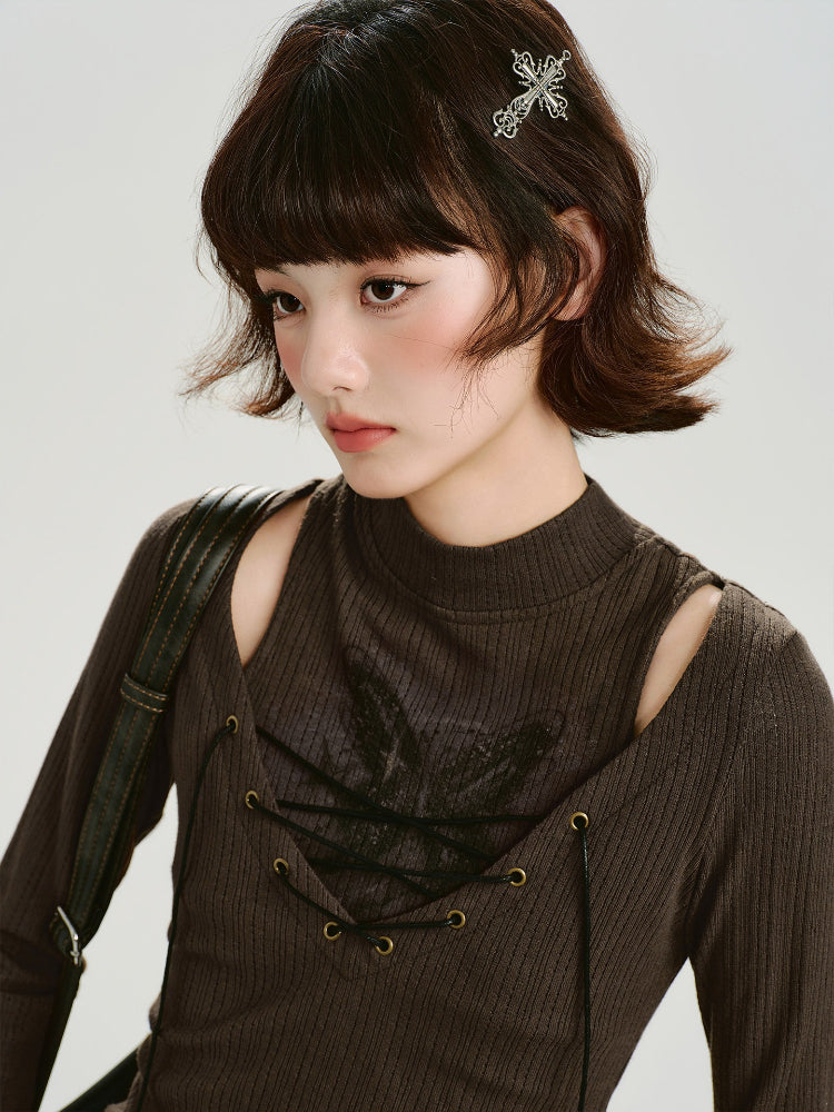 Close-up of the model's face and upper body, highlighting the brown long-sleeved ribbed top with cut-out shoulders and lace-up detail.