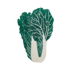 A close-up of a green napa cabbage-shaped accessory with white vein details.