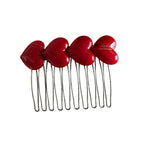 Red heart-shaped hair comb