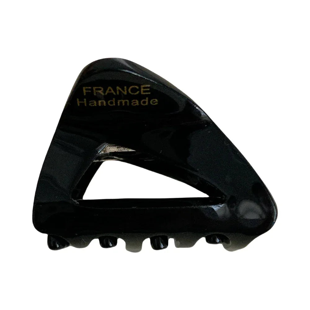 Black triangular hair clip with "FRANCE Handmade" engraved in gold Main image