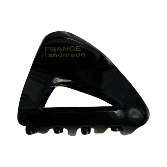 Black triangular hair clip with "FRANCE Handmade" engraved in gold