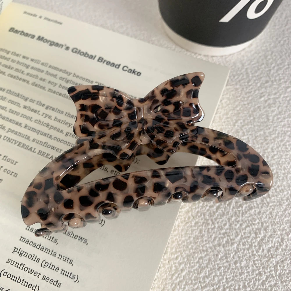 Chic Bow Cutout Acetate Hair Claw Clip - 3.5 Inch Trendy Pattern Collection