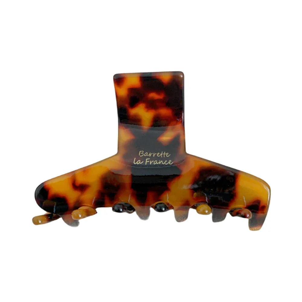 A tortoiseshell patterned hair claw clip with the 'Barrette la France' logo. Main image