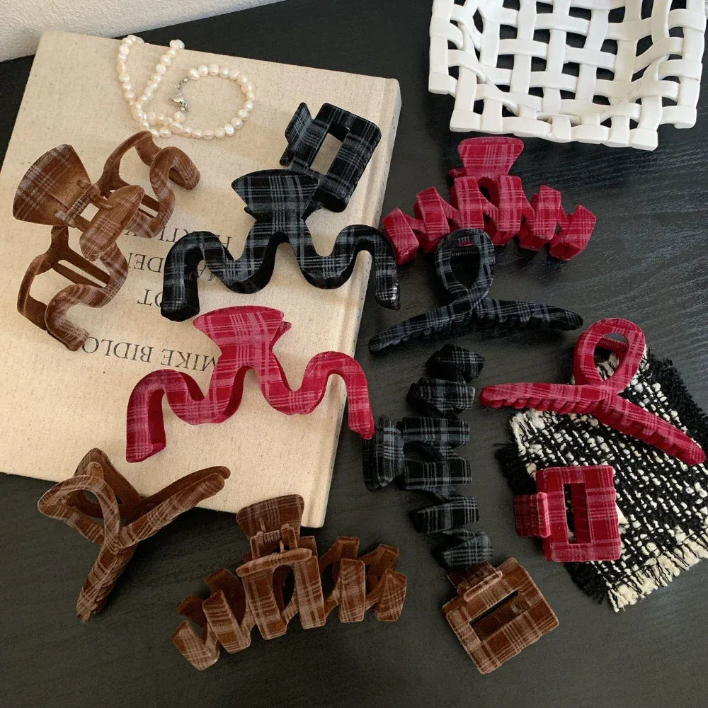 Collection of plaid velvet hair claw clips in various colors and shapes